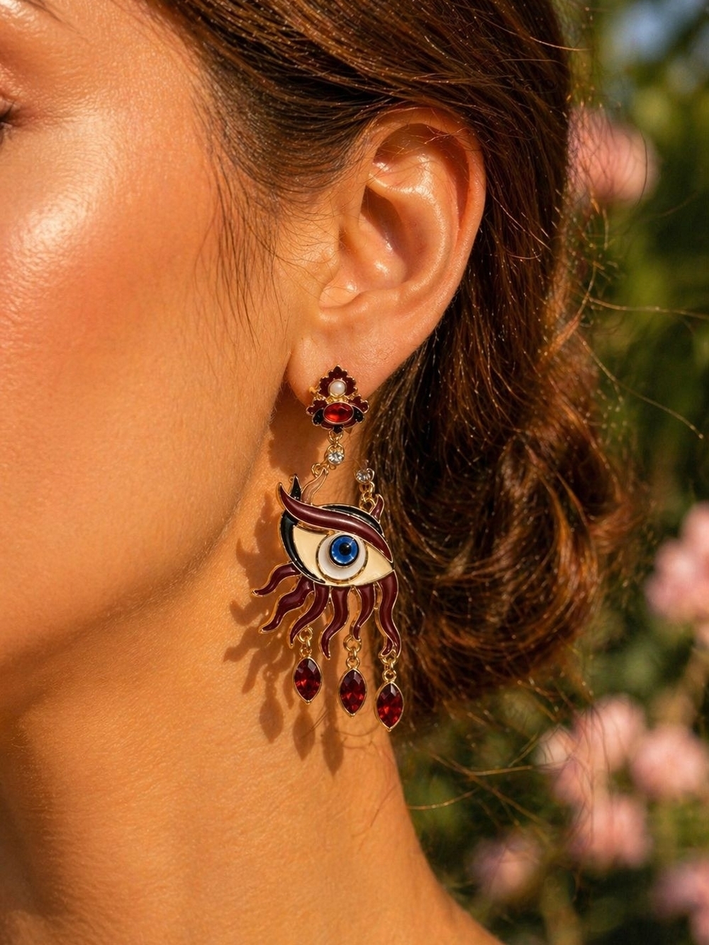 Gold-Tone Red Eye Drop Earrings with Blue Center